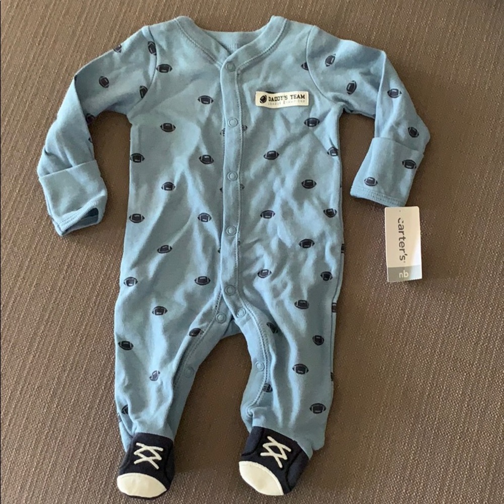 NWT Carter’s footie pajamas. Size NB.